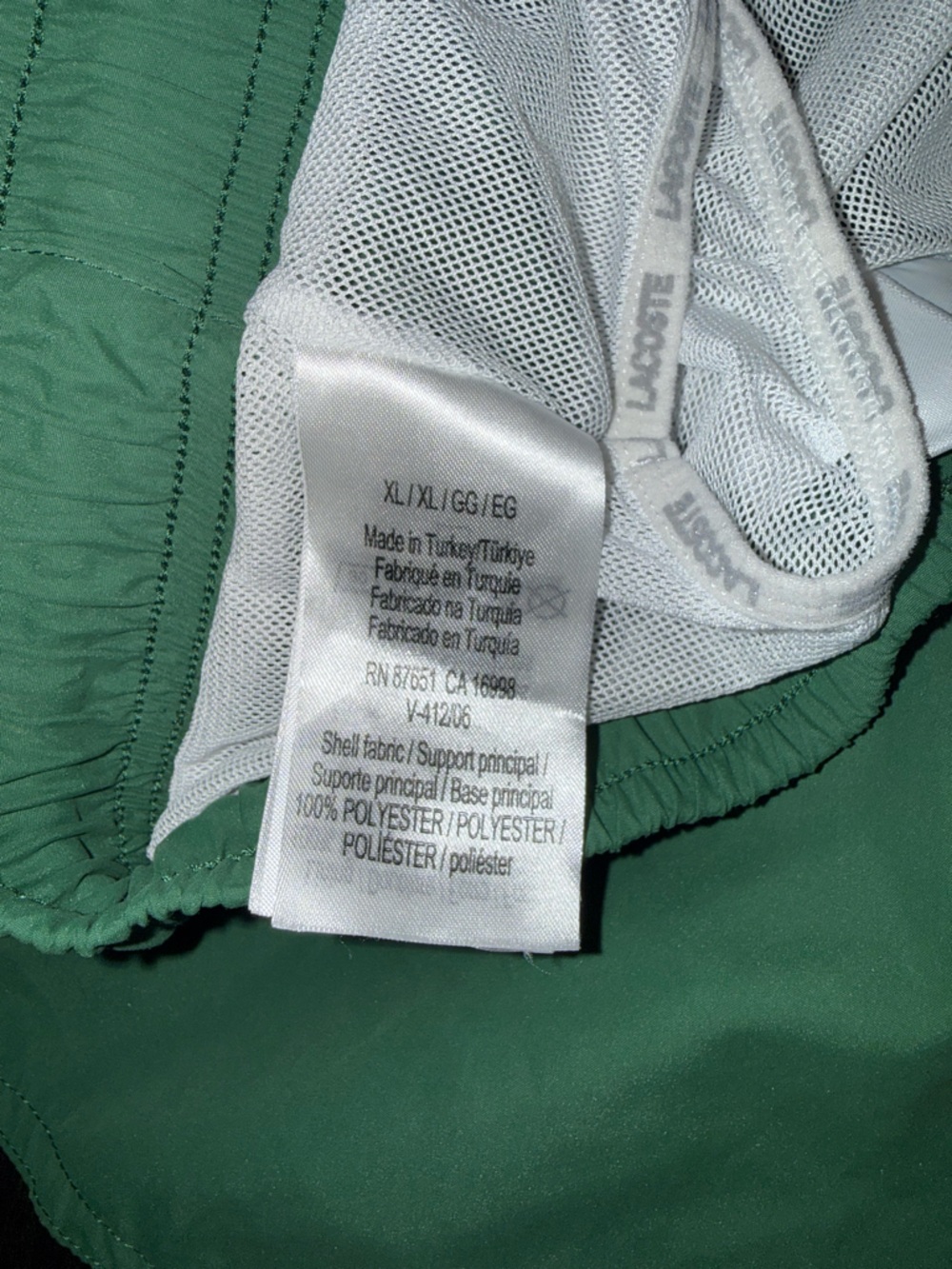 Lacoste Dark Green Athletic Swim Shorts with White Logo Text - Picture 7 of 8